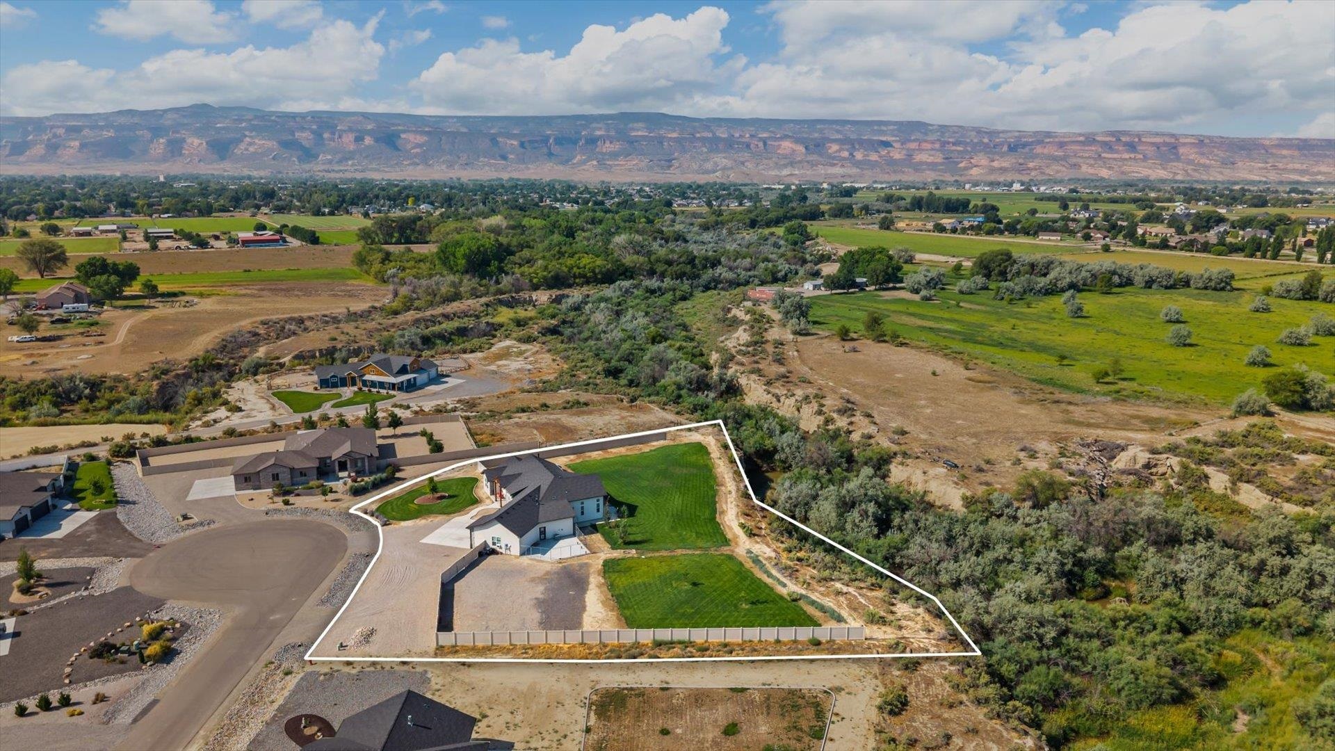1730 Stremel Creek Fruita, CO 81521 - Photo 41 of 42 an aerial view of residential houses with outdoor space