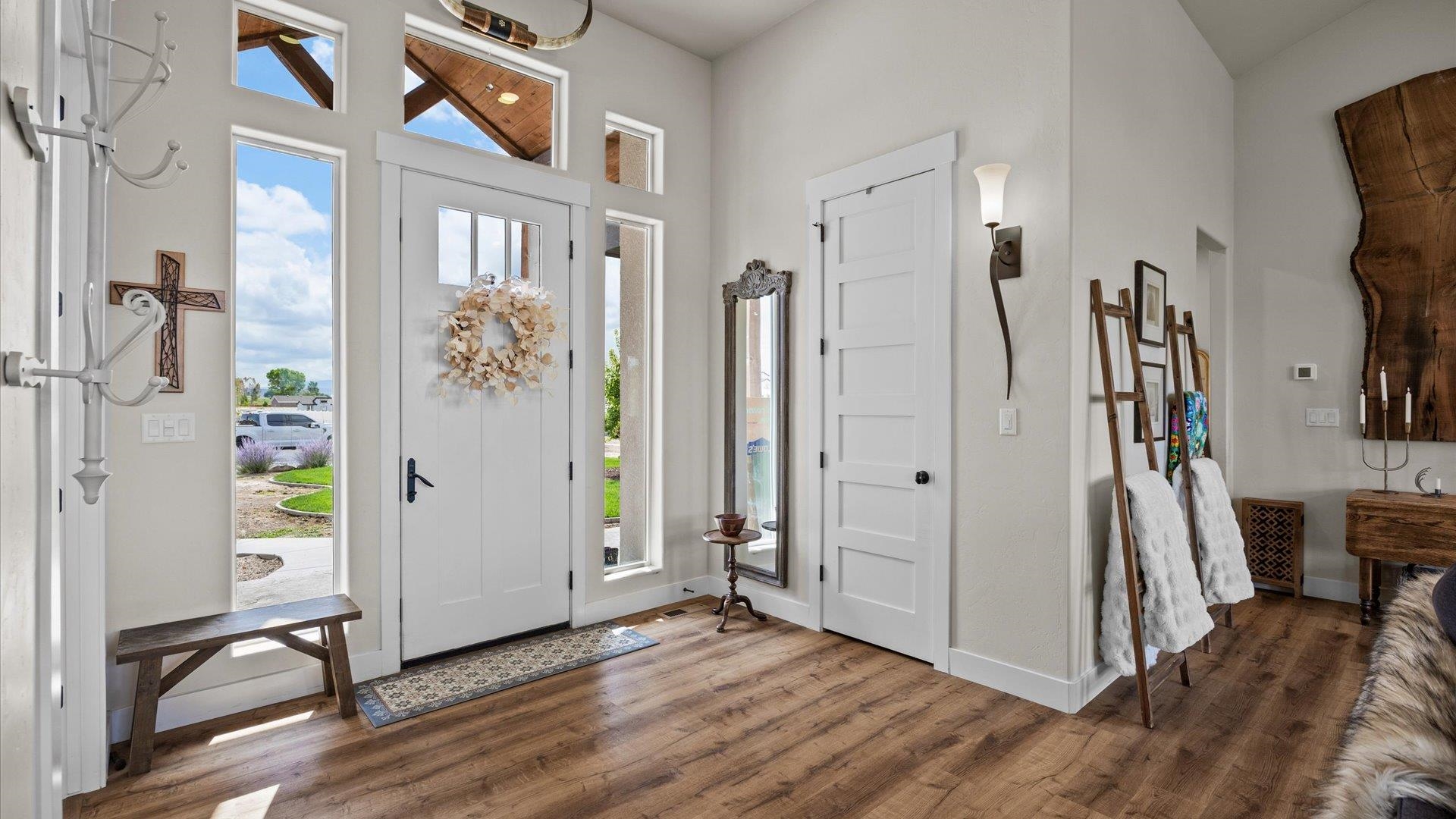 1730 Stremel Creek Fruita, CO 81521 - Photo 7 of 42 a view of a livingroom with furniture and a hallway