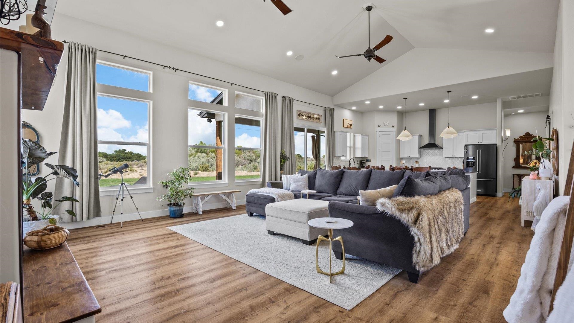 1730 Stremel Creek Fruita, CO 81521 - Photo 9 of 42 a living room with furniture and a large window