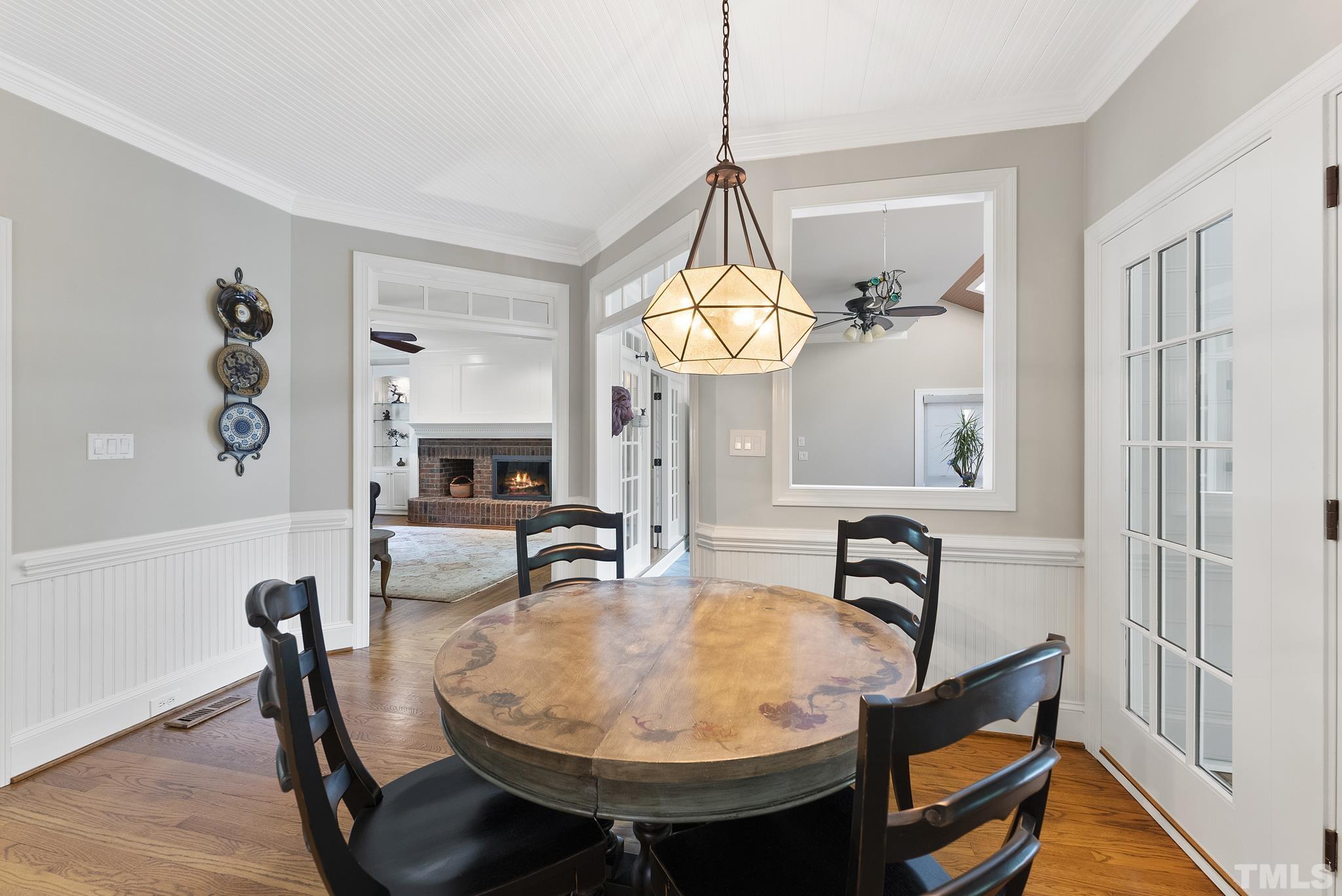1113 Bentham Drive Raleigh, NC 27614 - Photo 17 of 78 a view of a dining room with furniture and a chandelier