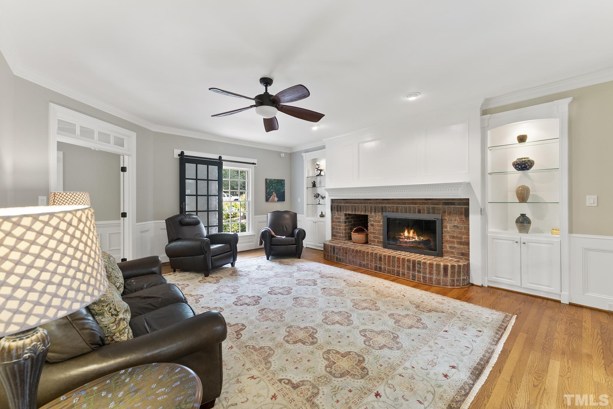 1113 Bentham Drive Raleigh, NC 27614 - Photo 19 of 78 a living room with furniture and a fireplace