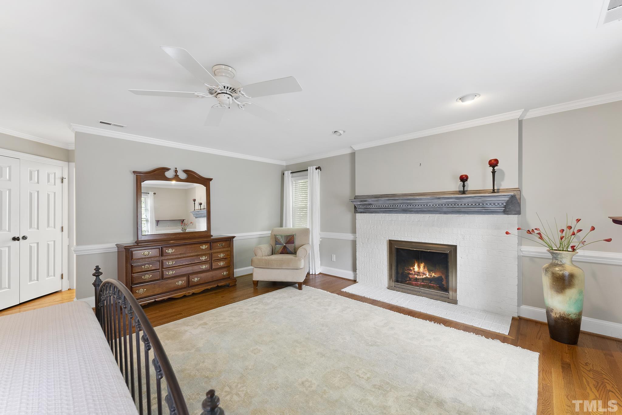 1113 Bentham Drive Raleigh, NC 27614 - Photo 29 of 78 a living room with furniture and a fireplace