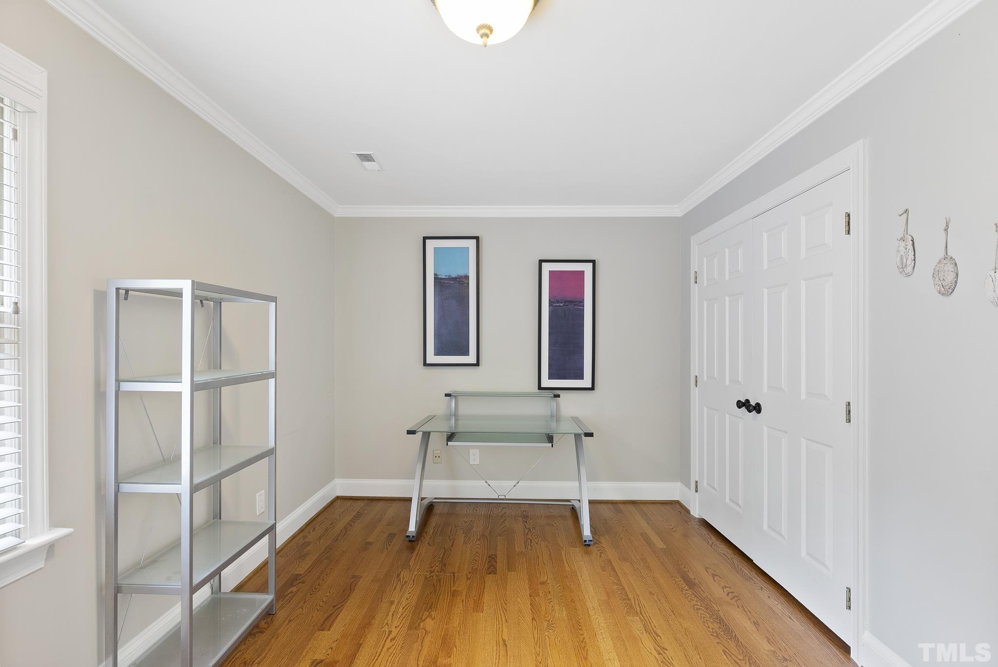 1113 Bentham Drive Raleigh, NC 27614 - Photo 33 of 78 a bedroom with a bed and a view of bathroom