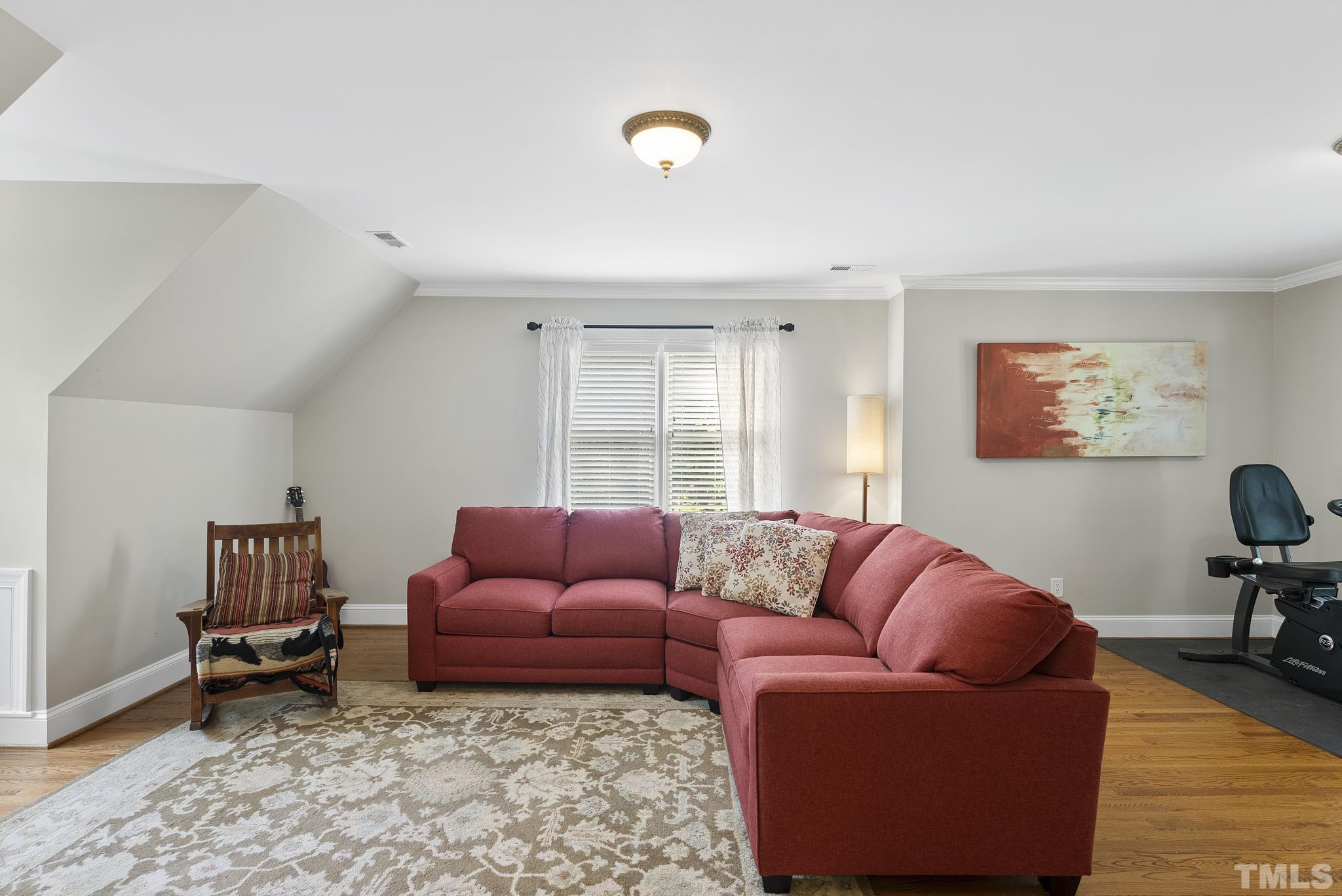 1113 Bentham Drive Raleigh, NC 27614 - Photo 37 of 78 a living room with furniture and a rug