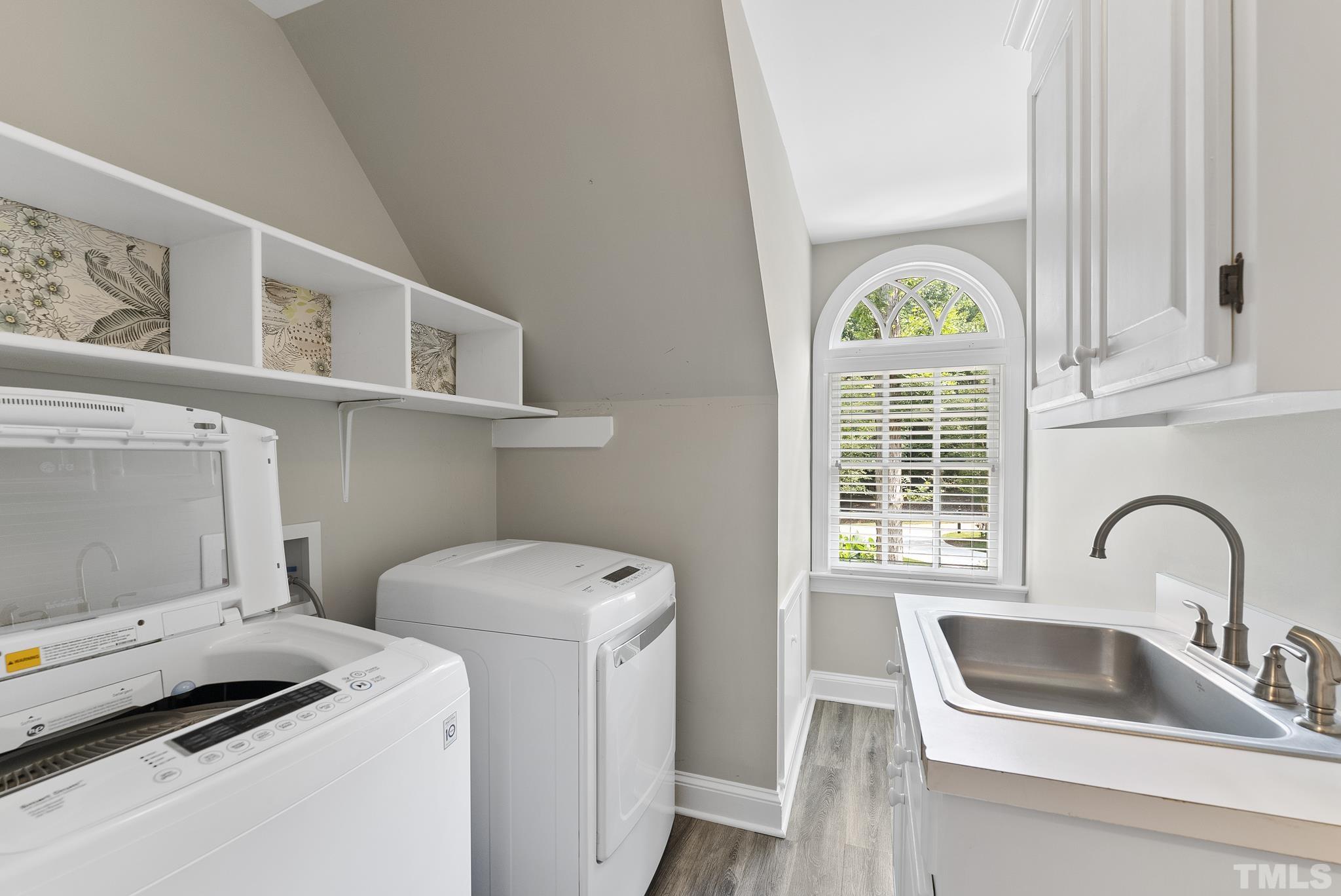 1113 Bentham Drive Raleigh, NC 27614 - Photo 39 of 78 a view of storage and utility room with washer and dryer