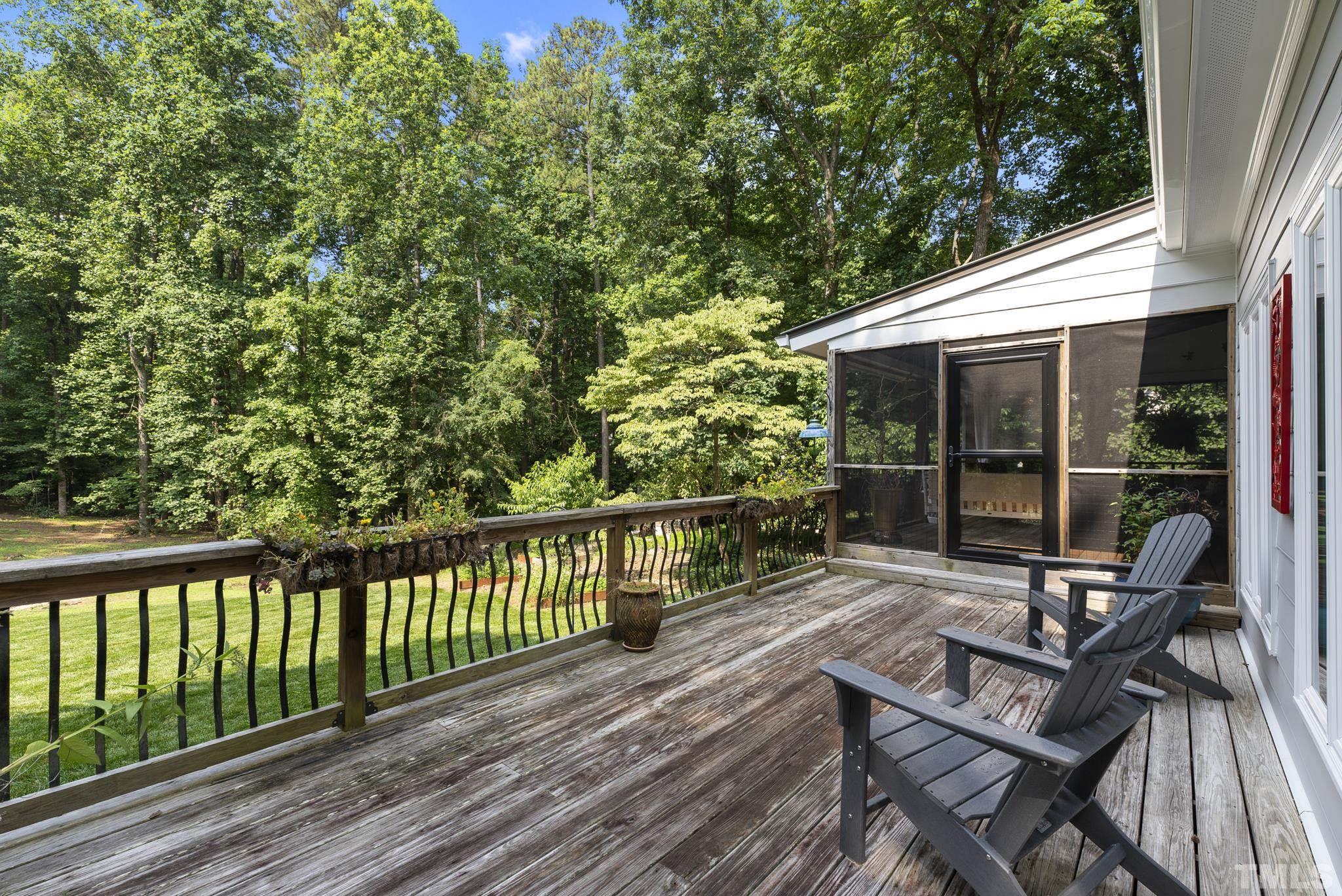 1113 Bentham Drive Raleigh, NC 27614 - Photo 48 of 78 a view of a balcony with wooden floor and outdoor seating