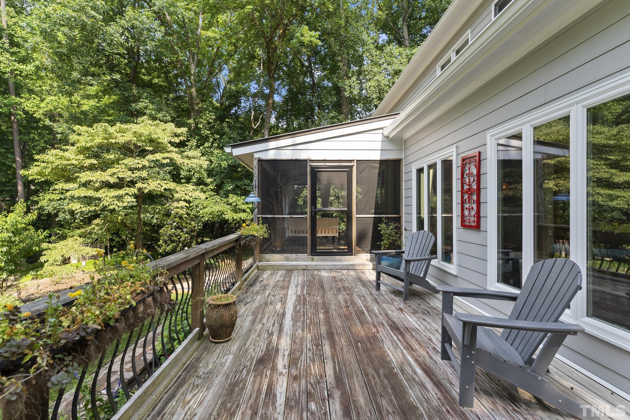 1113 Bentham Drive Raleigh, NC 27614 - Photo 49 of 78 a view of balcony with wooden floor and outdoor seating