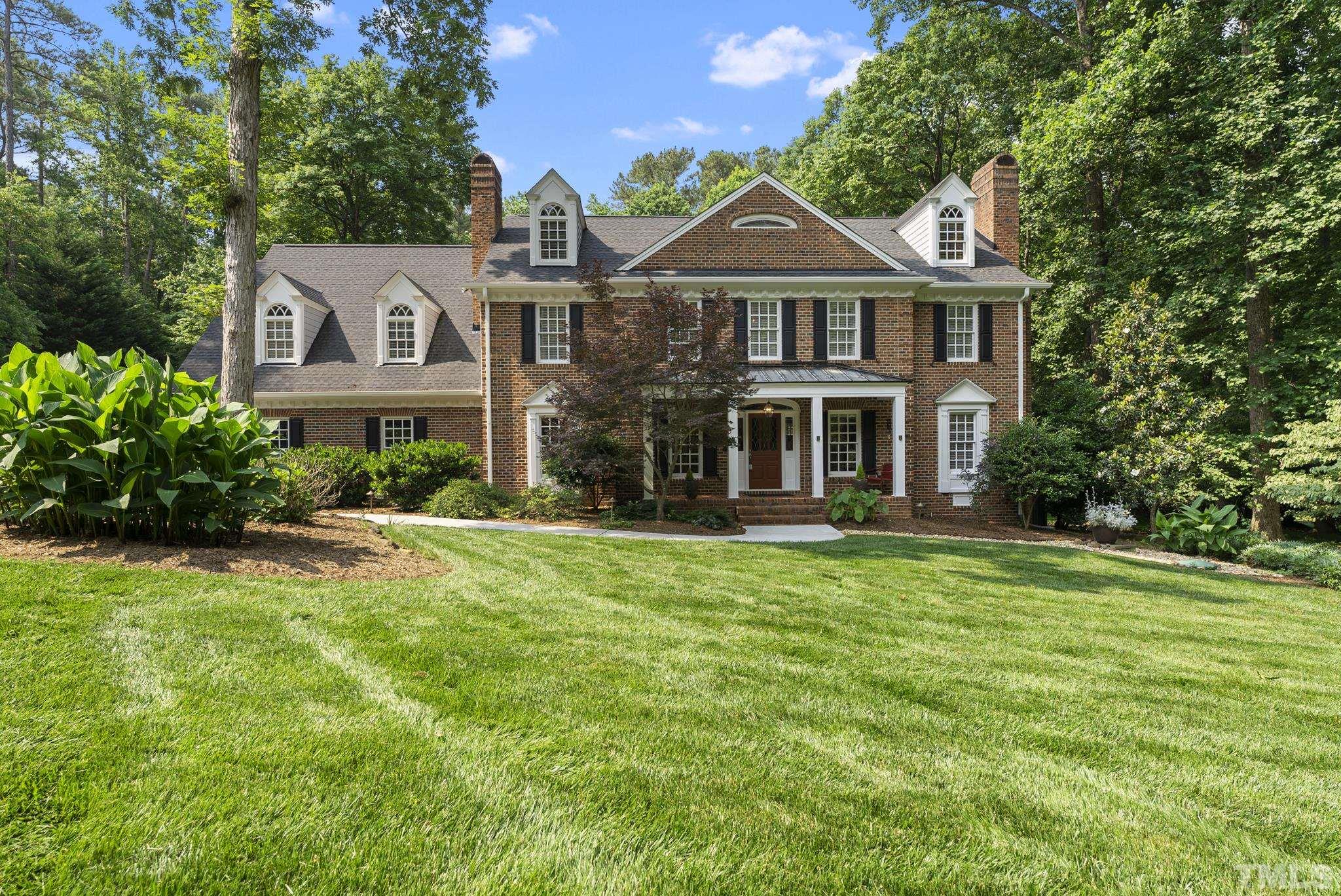 1113 Bentham Drive Raleigh, NC 27614 - Photo 56 of 78 a front view of a house with a yard