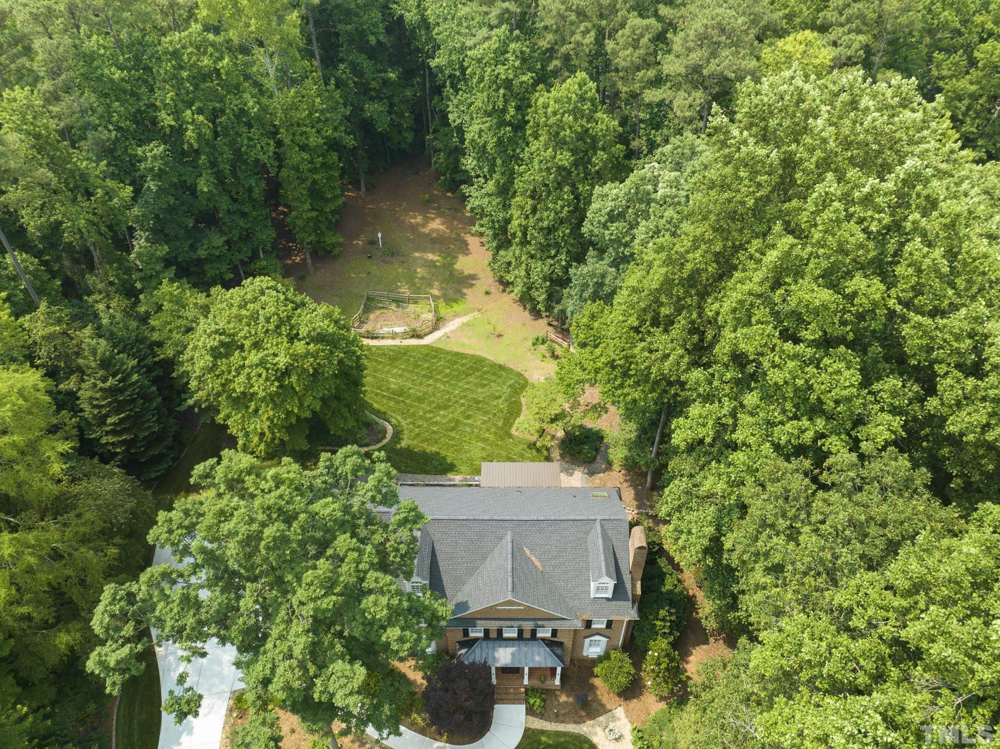 1113 Bentham Drive Raleigh, NC 27614 - Photo 57 of 78 an aerial view of a house with a yard and garden