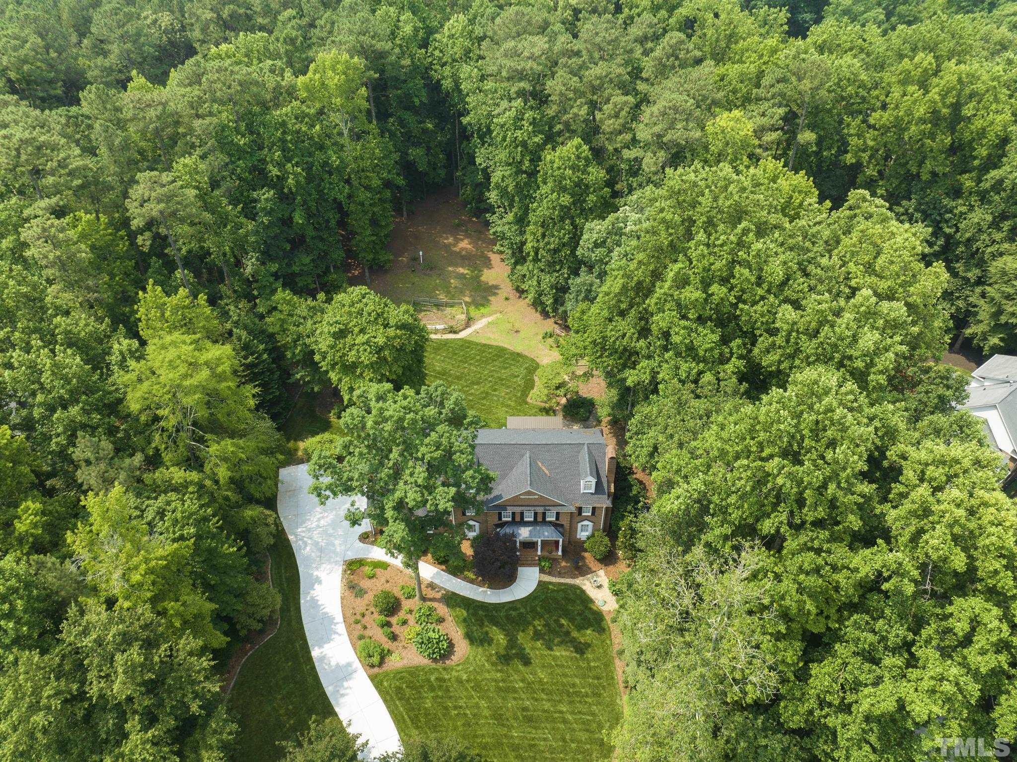1113 Bentham Drive Raleigh, NC 27614 - Photo 58 of 78 an aerial view of residential house with outdoor space and trees all around