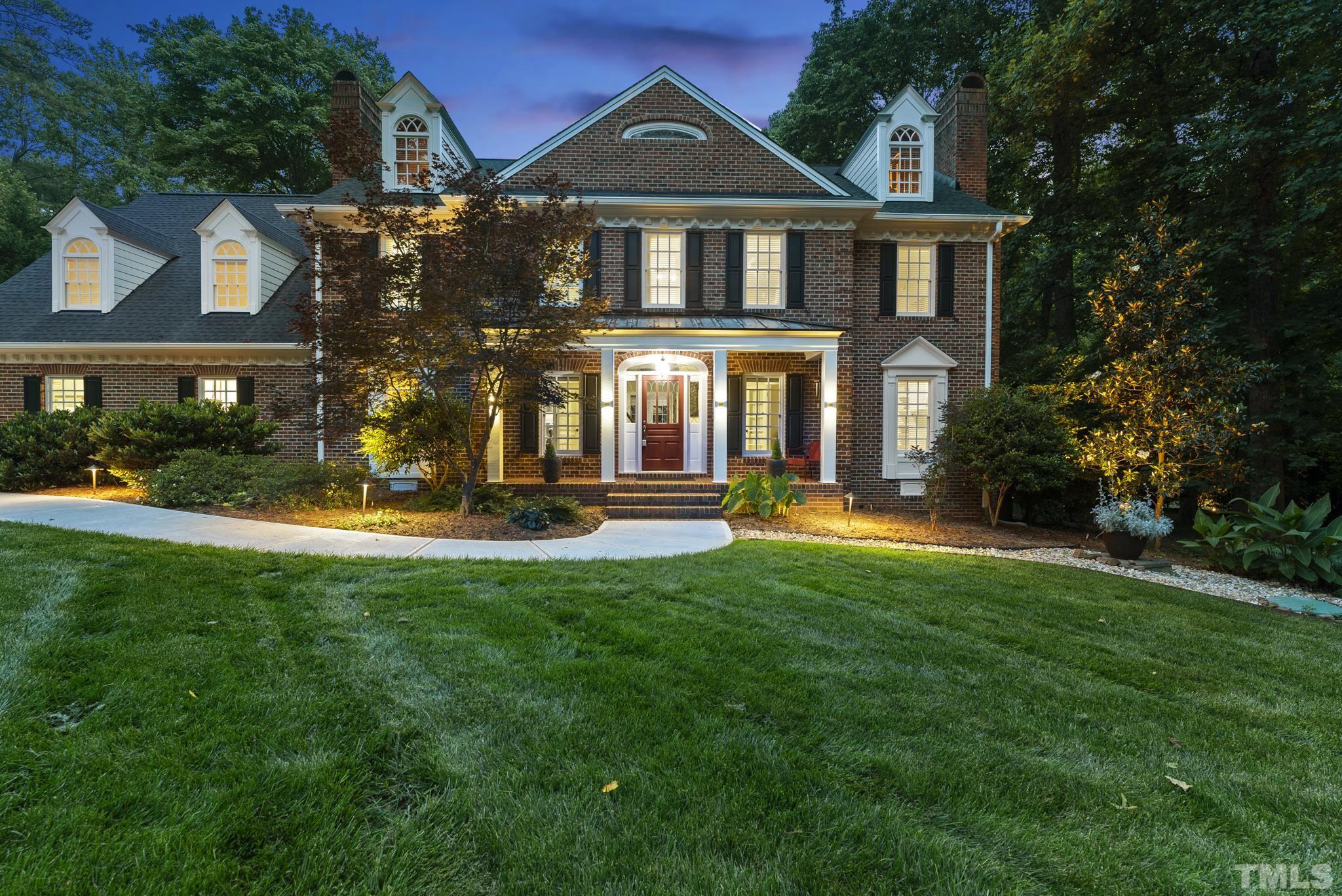 1113 Bentham Drive Raleigh, NC 27614 - Photo 72 of 78 a front view of a house with a yard