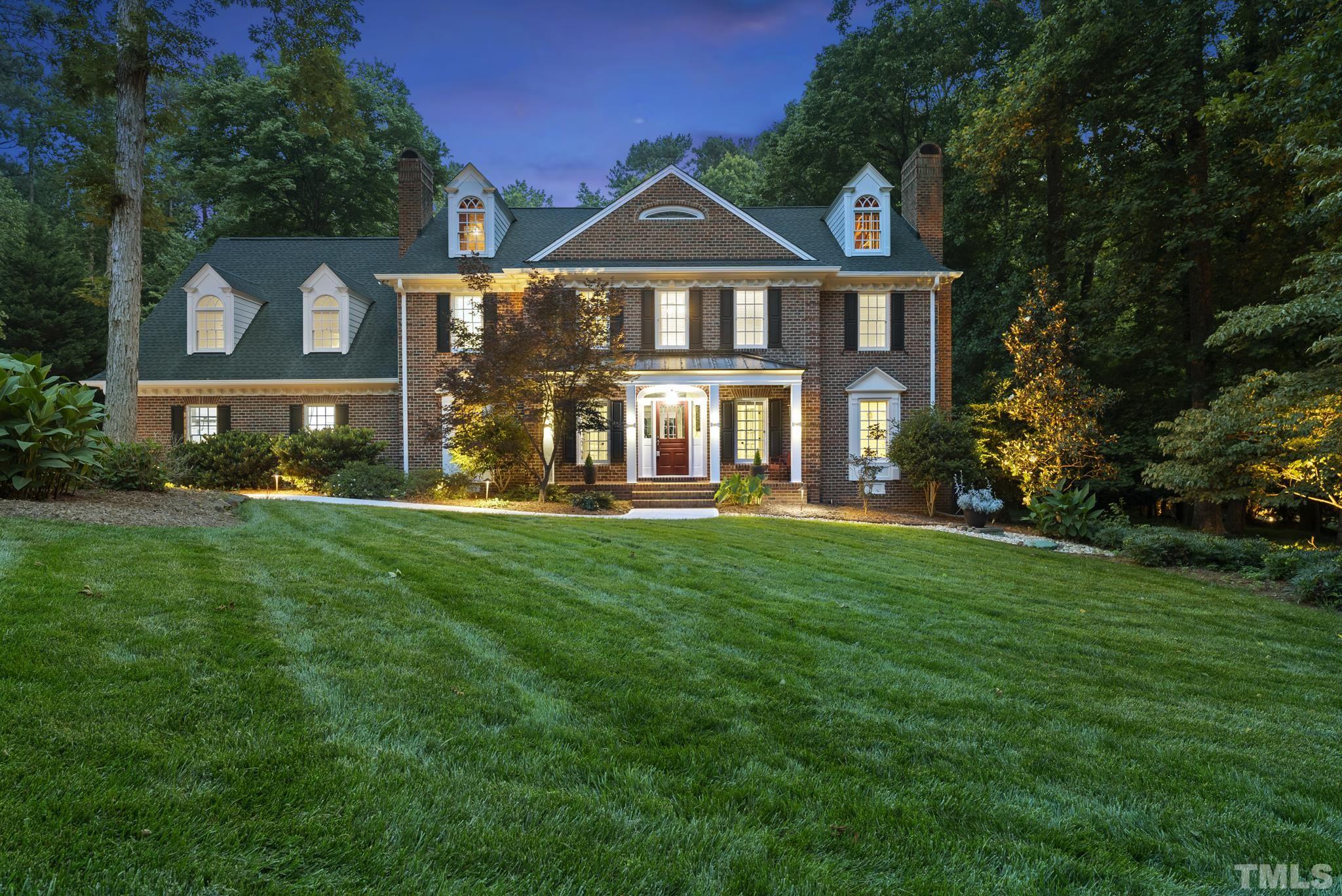 1113 Bentham Drive Raleigh, NC 27614 - Photo 78 of 78 a front view of a house with a yard