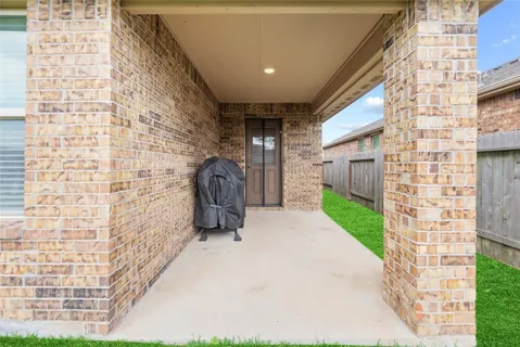 a view of yard with grass and trees