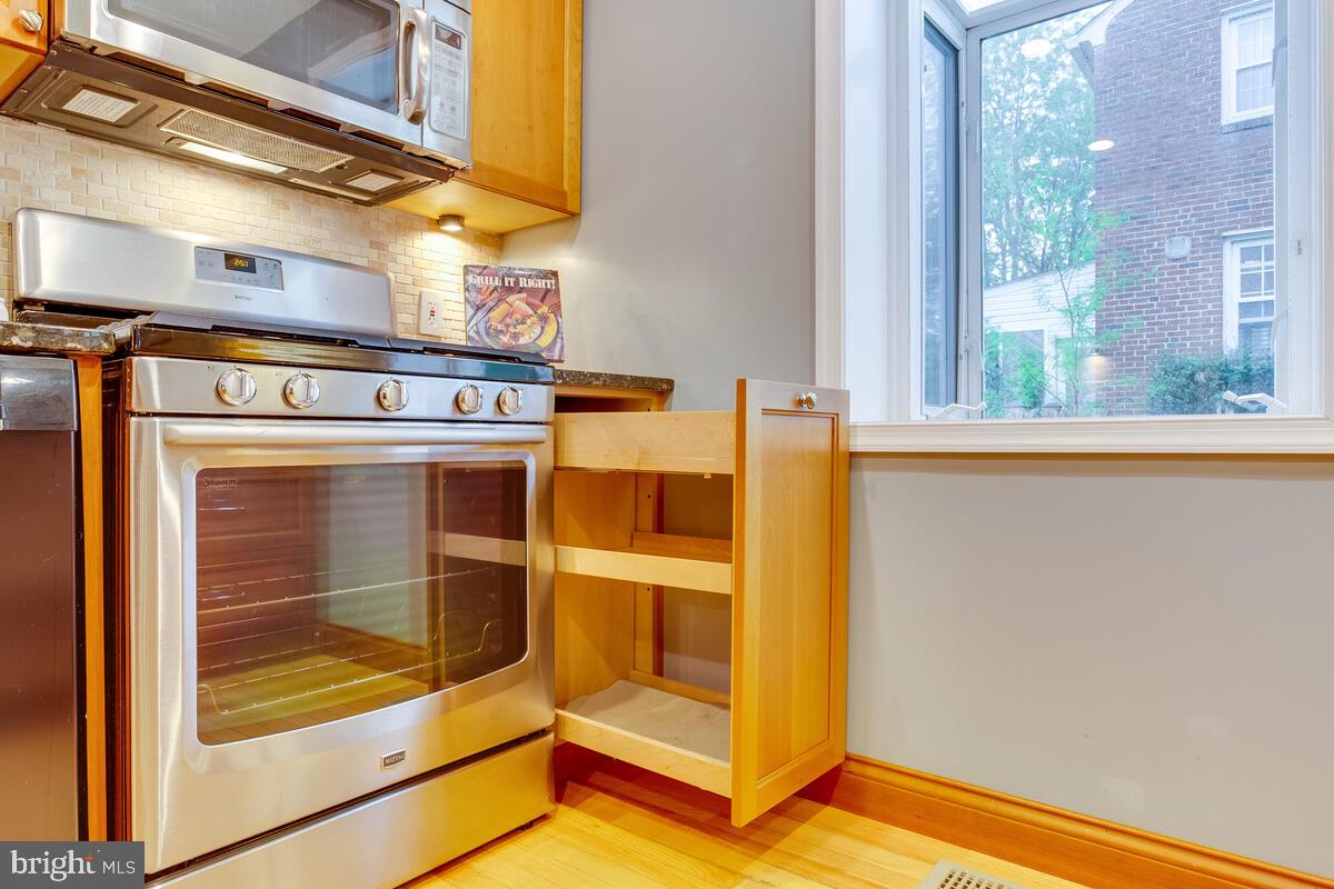 33 Dunmore Road Baltimore, MD 21228 - Photo 26 of 78 Pullout built-in cabinet shelving