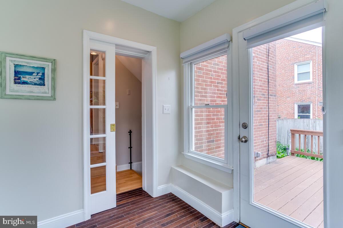 33 Dunmore Road Baltimore, MD 21228 - Photo 34 of 78 a view of an entryway with wooden floor and windows