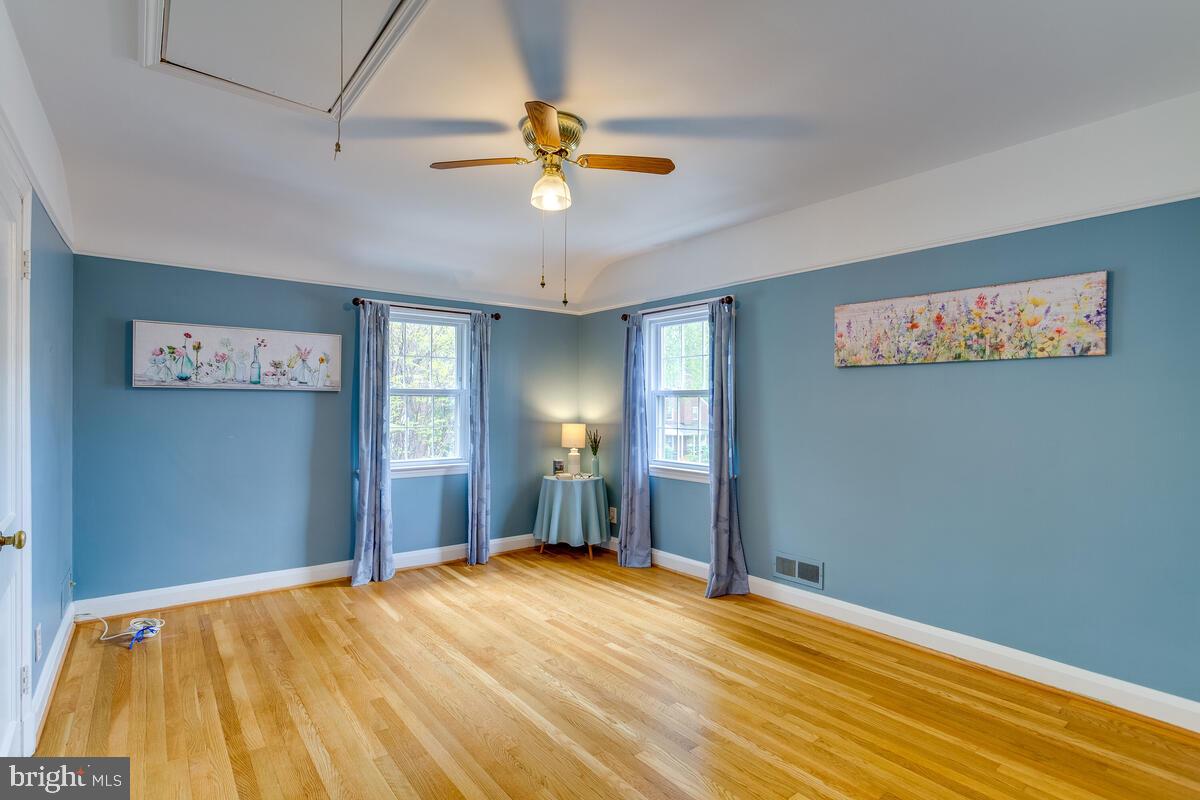 33 Dunmore Road Baltimore, MD 21228 - Photo 40 of 78 a view of empty room with window and ceiling fan