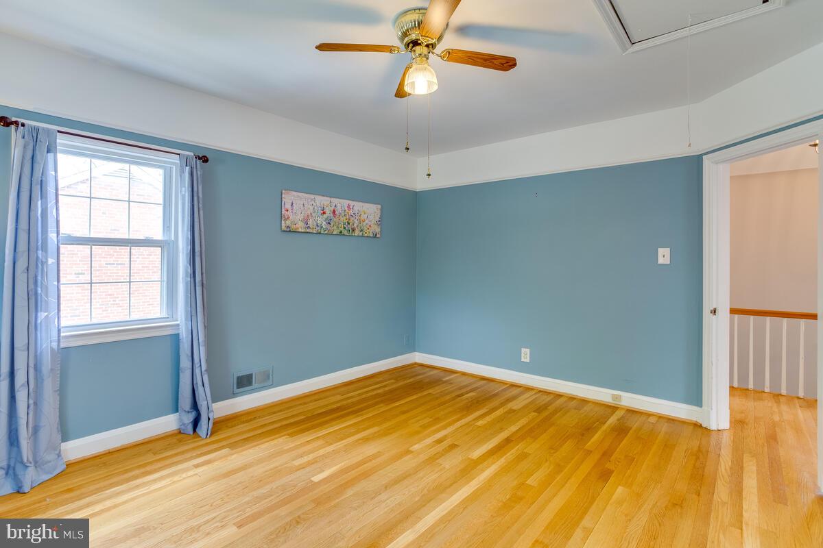 33 Dunmore Road Baltimore, MD 21228 - Photo 43 of 78 a view of empty room with wooden floor