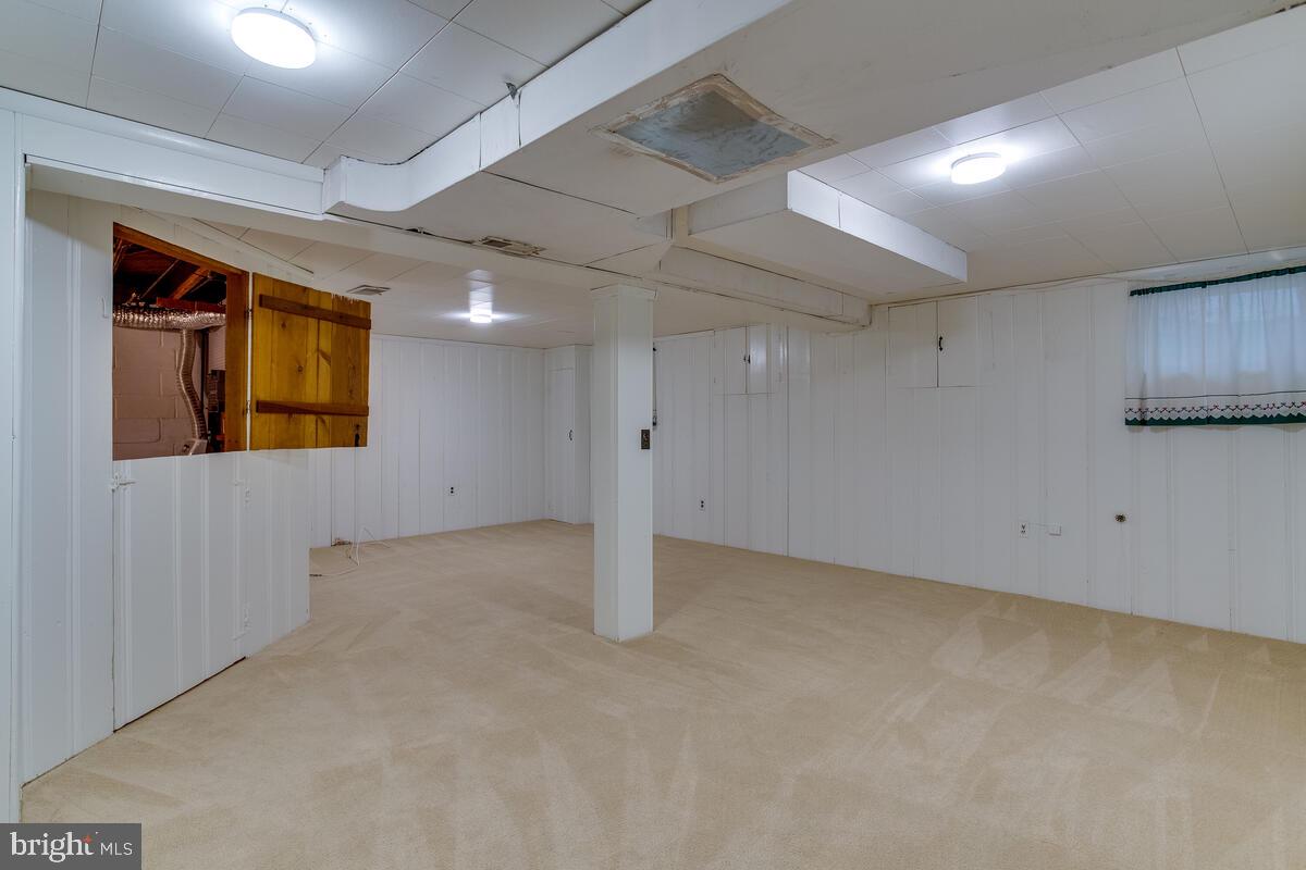 33 Dunmore Road Baltimore, MD 21228 - Photo 53 of 78 an empty room with windows