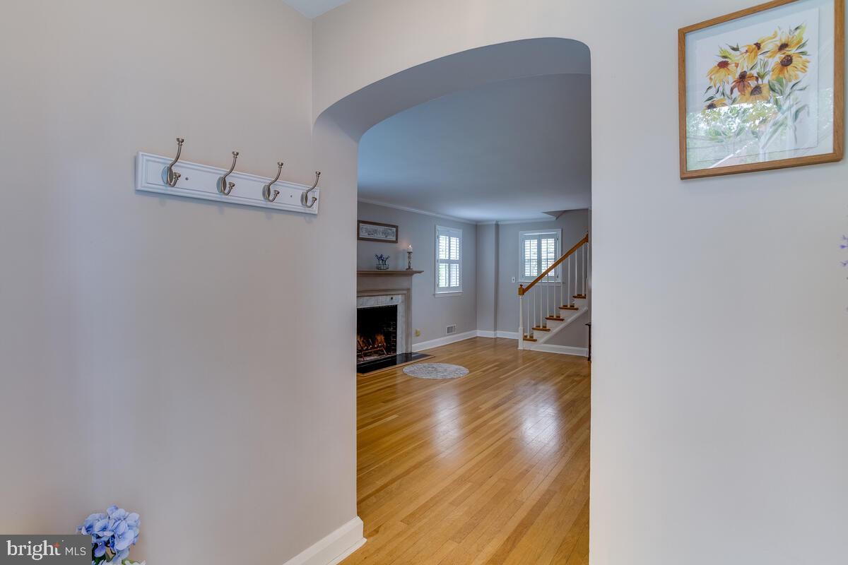 33 Dunmore Road Baltimore, MD 21228 - Photo 6 of 78 a view of livingroom with hardwood floor and a kitchen