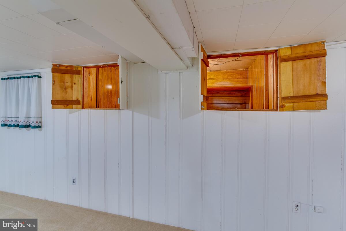 33 Dunmore Road Baltimore, MD 21228 - Photo 61 of 78 a view of an empty room with a window