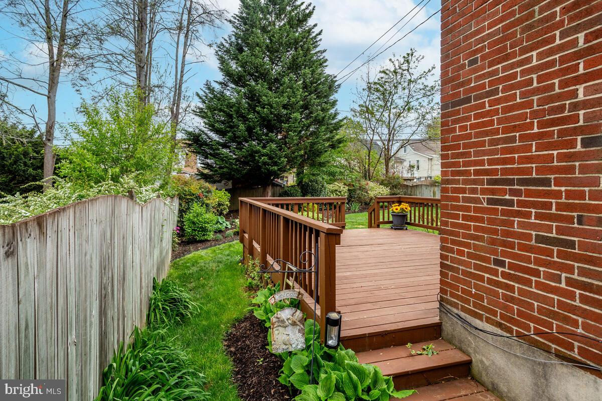 33 Dunmore Road Baltimore, MD 21228 - Photo 75 of 78 a view of a pathway with a wooden fence
