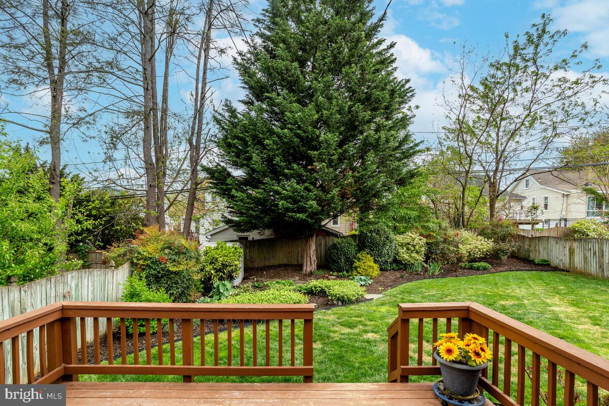 33 Dunmore Road Baltimore, MD 21228 - Photo 78 of 78 a view of a wooden deck and yard with trees