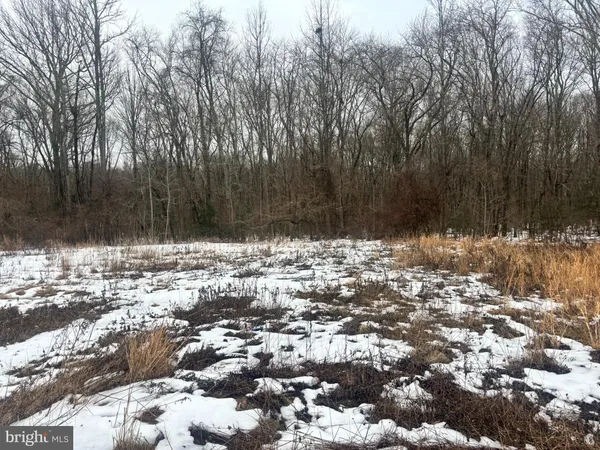 a view of water covered with snow