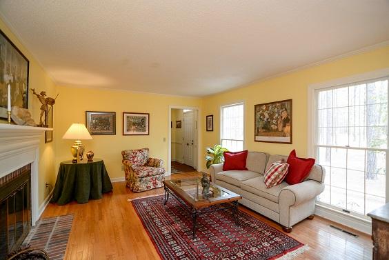 150 Cardinal Road Southern Pines, NC 28387 - Photo 2 of 49 Spacious Formal Living Room with Wood Burning Fireplace.