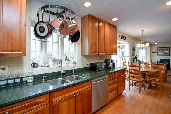 150 Cardinal Road Southern Pines, NC 28387 - Photo 24 of 49 Galley Kitchen with Granite Counter tops and Stainless Appliances.
