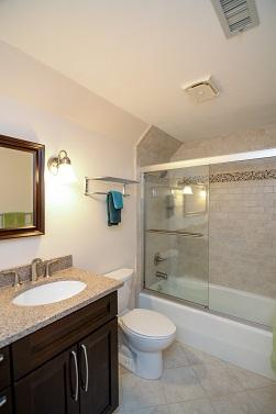 150 Cardinal Road Southern Pines, NC 28387 - Photo 38 of 49 Upstairs Full Bath with Double Vanities(Ganite), Tile floor & Tub/Shower with Tile Surround.