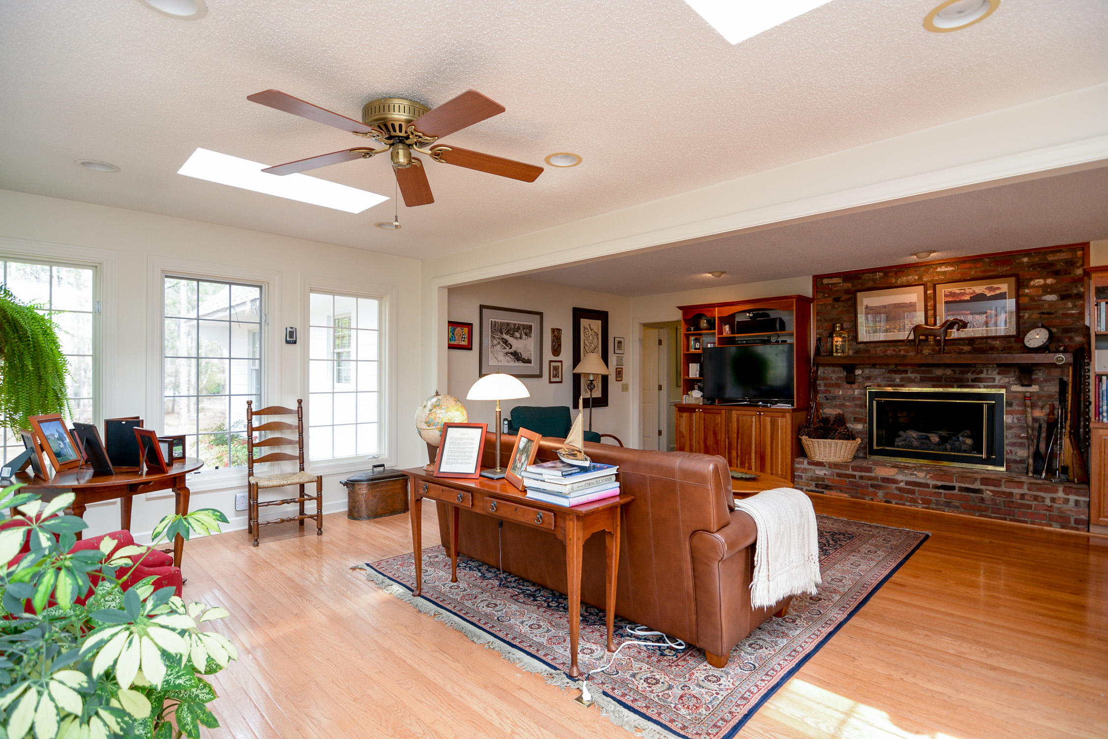150 Cardinal Road Southern Pines, NC 28387 - Photo 6 of 49 Family Room Features Masonry Fireplace with gas logs.