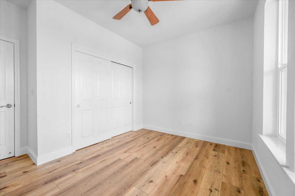 35221 John Albert Drive Madera, CA 93636 - Photo 13 of 22 wooden floor in an empty room