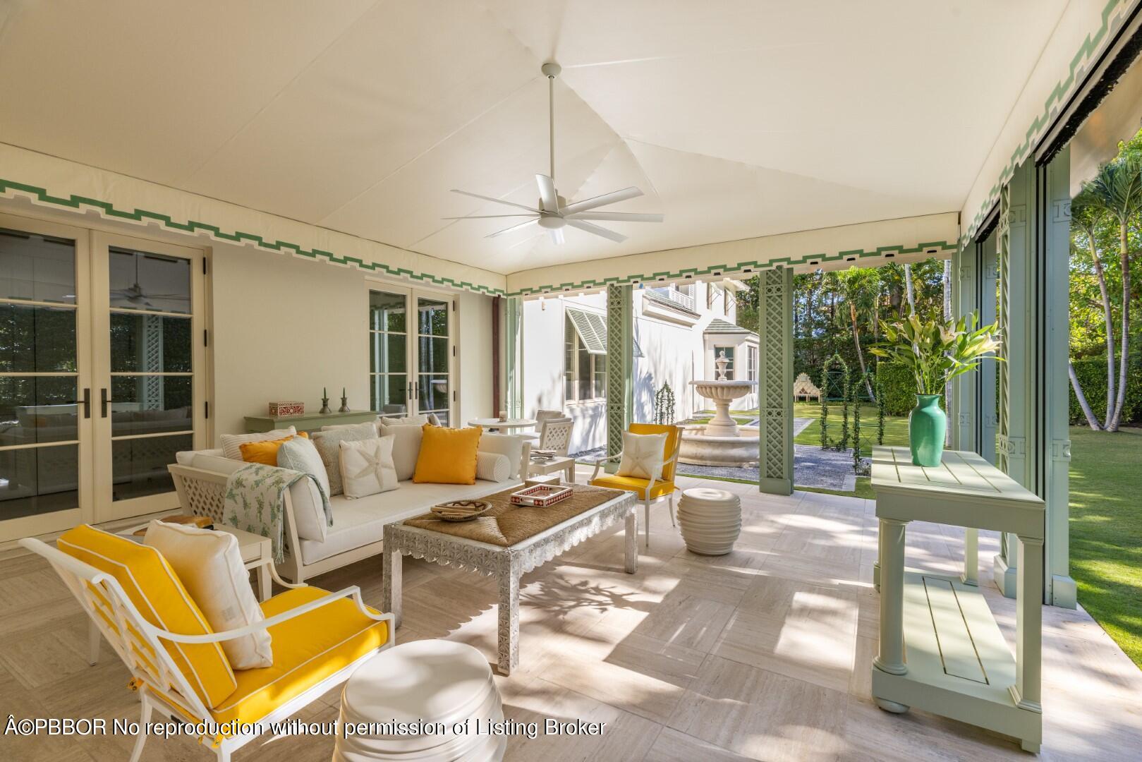 710 South County Road Palm Beach, FL 33480 - Photo 38 of 69 a living room with furniture and a large window