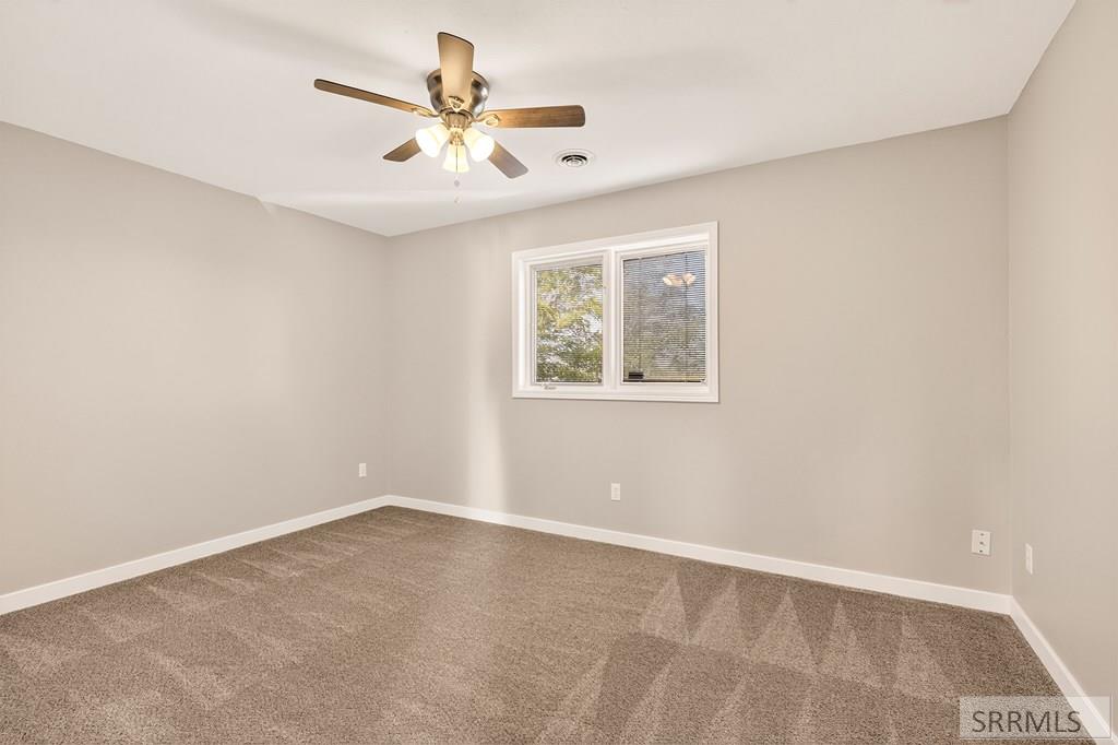 9233 South Ammon Road Idaho Falls, ID 83406 - Photo 16 of 40 Bedroom 3