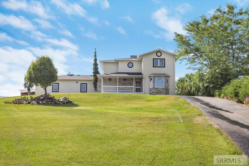 9233 South Ammon Road Idaho Falls, ID 83406 - Photo 2 of 40 Front Exterior