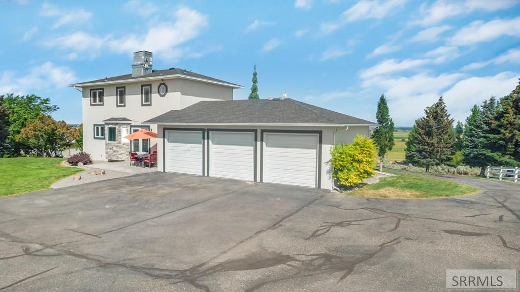 9233 South Ammon Road Idaho Falls, ID 83406 - Photo 25 of 40 Back Exterior