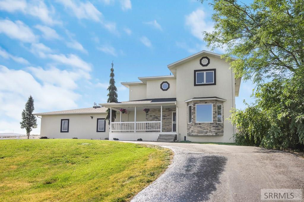 9233 South Ammon Road Idaho Falls, ID 83406 - Photo 3 of 40 Front Exterior