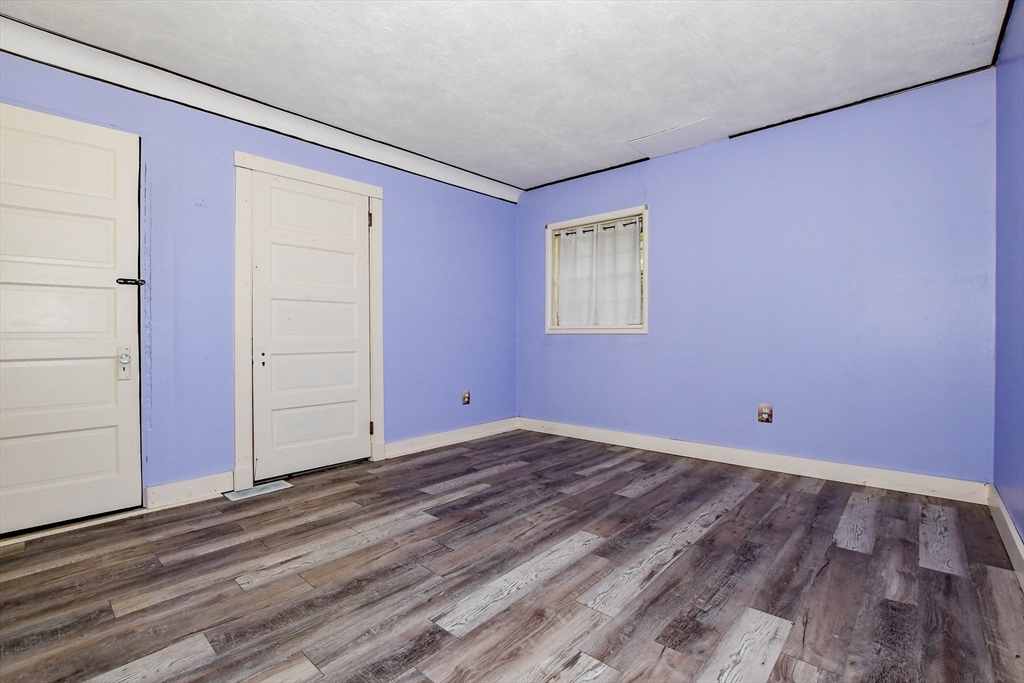 6 Gilbert Way Wareham, MA 02571 - Photo 27 of 41 an empty room with a bench