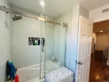 a bedroom with furniture and a flat screen tv