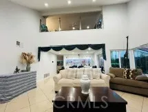 a bed room with a bed window and couch