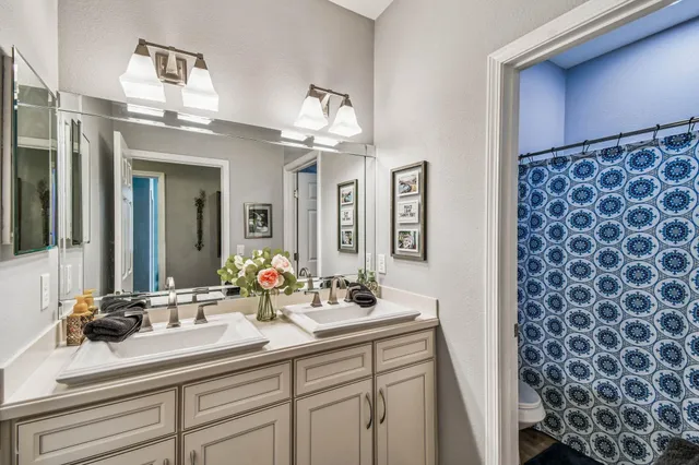 a bedroom with bed and a window