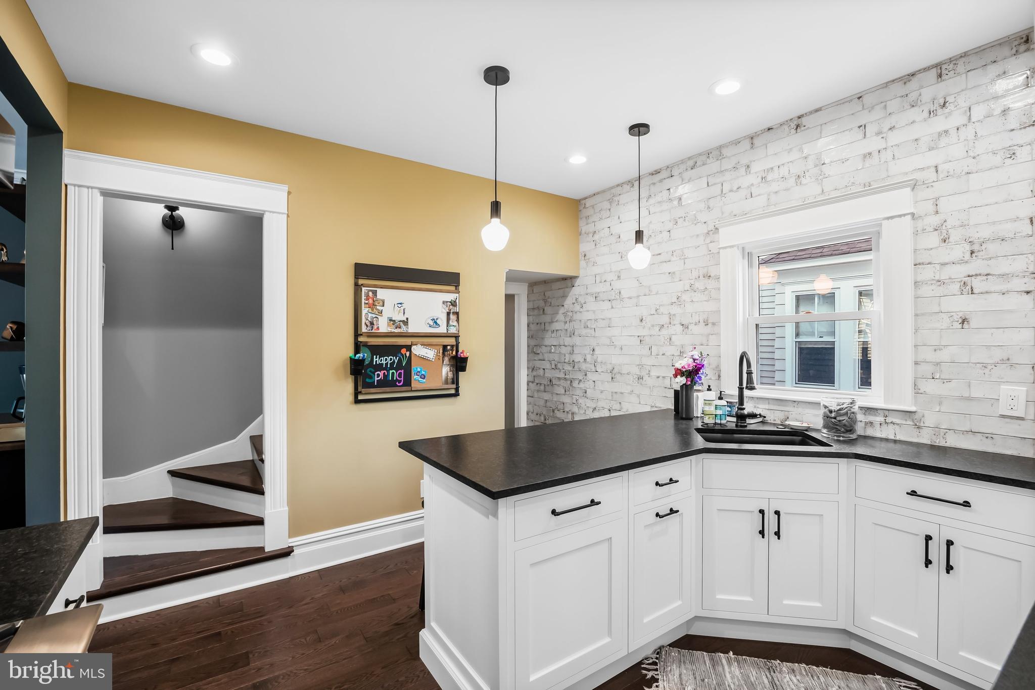 43 Estaugh Avenue Haddonfield, NJ 08033 - Photo 14 of 38 a kitchen with granite countertop a sink a white cabinets and a granite counter top