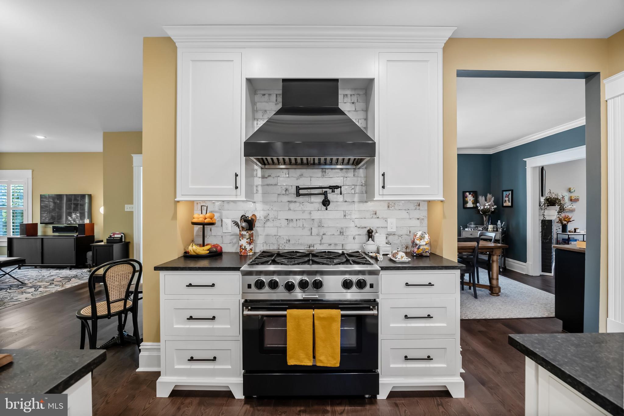 43 Estaugh Avenue Haddonfield, NJ 08033 - Photo 15 of 38 a kitchen with stainless steel appliances a stove a sink and a microwave