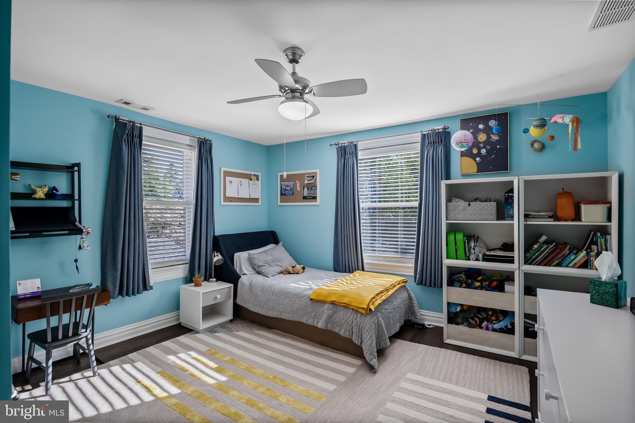 43 Estaugh Avenue Haddonfield, NJ 08033 - Photo 24 of 38 a bedroom with a bed wooden floor and book shelf