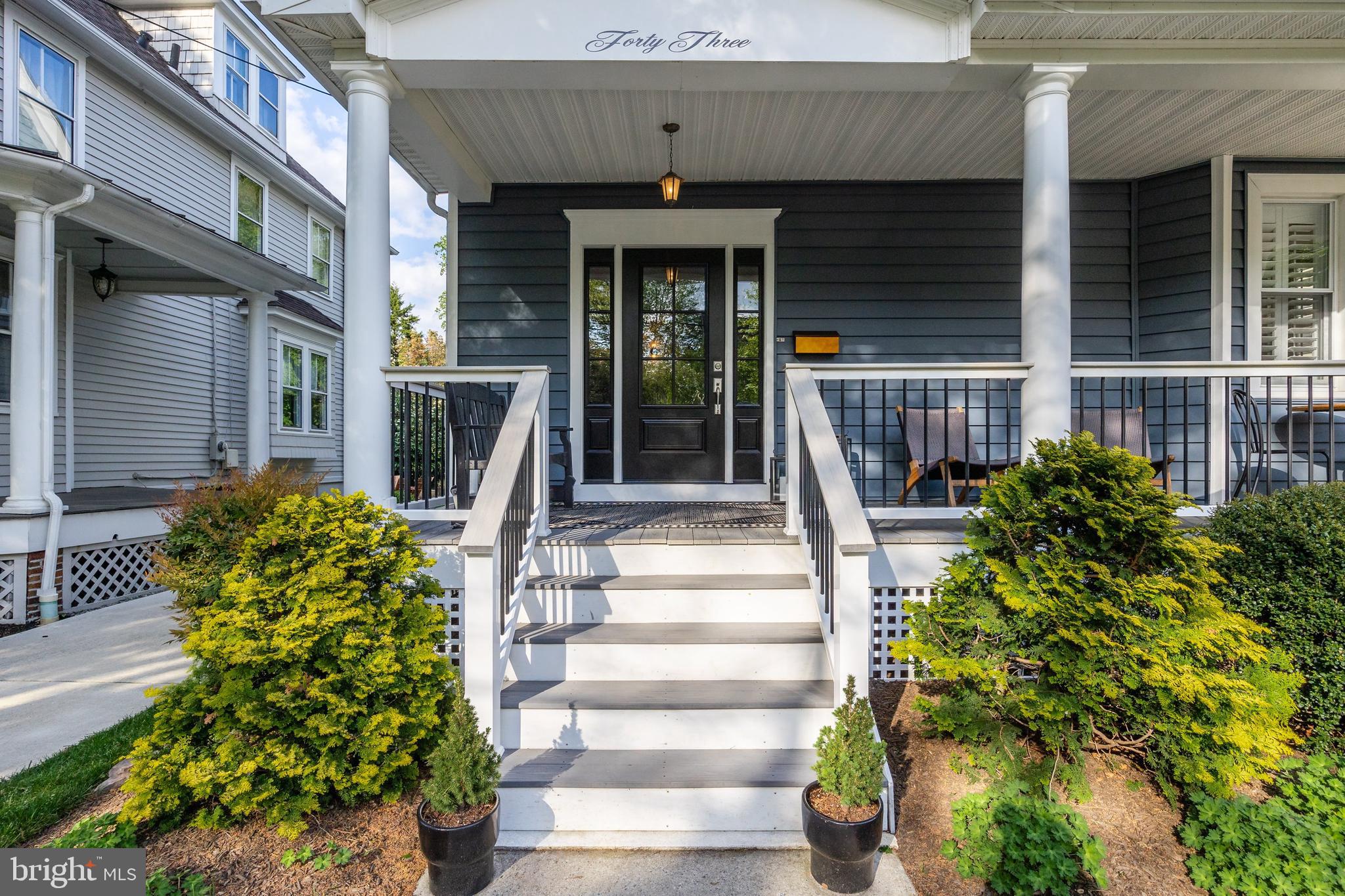 43 Estaugh Avenue Haddonfield, NJ 08033 - Photo 3 of 38 a front view of a house with a garden