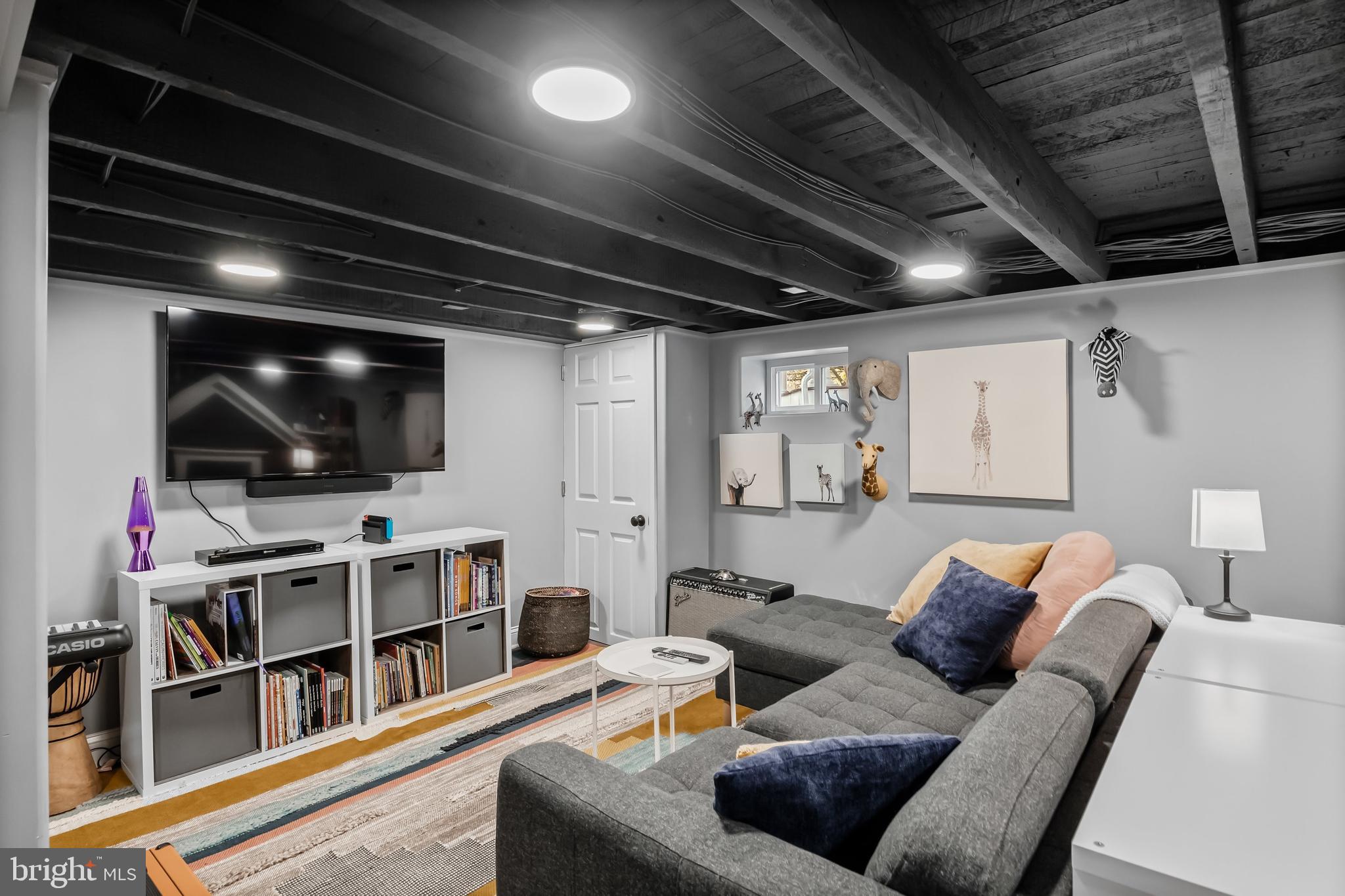 43 Estaugh Avenue Haddonfield, NJ 08033 - Photo 31 of 38 a living room with furniture and a flat screen tv