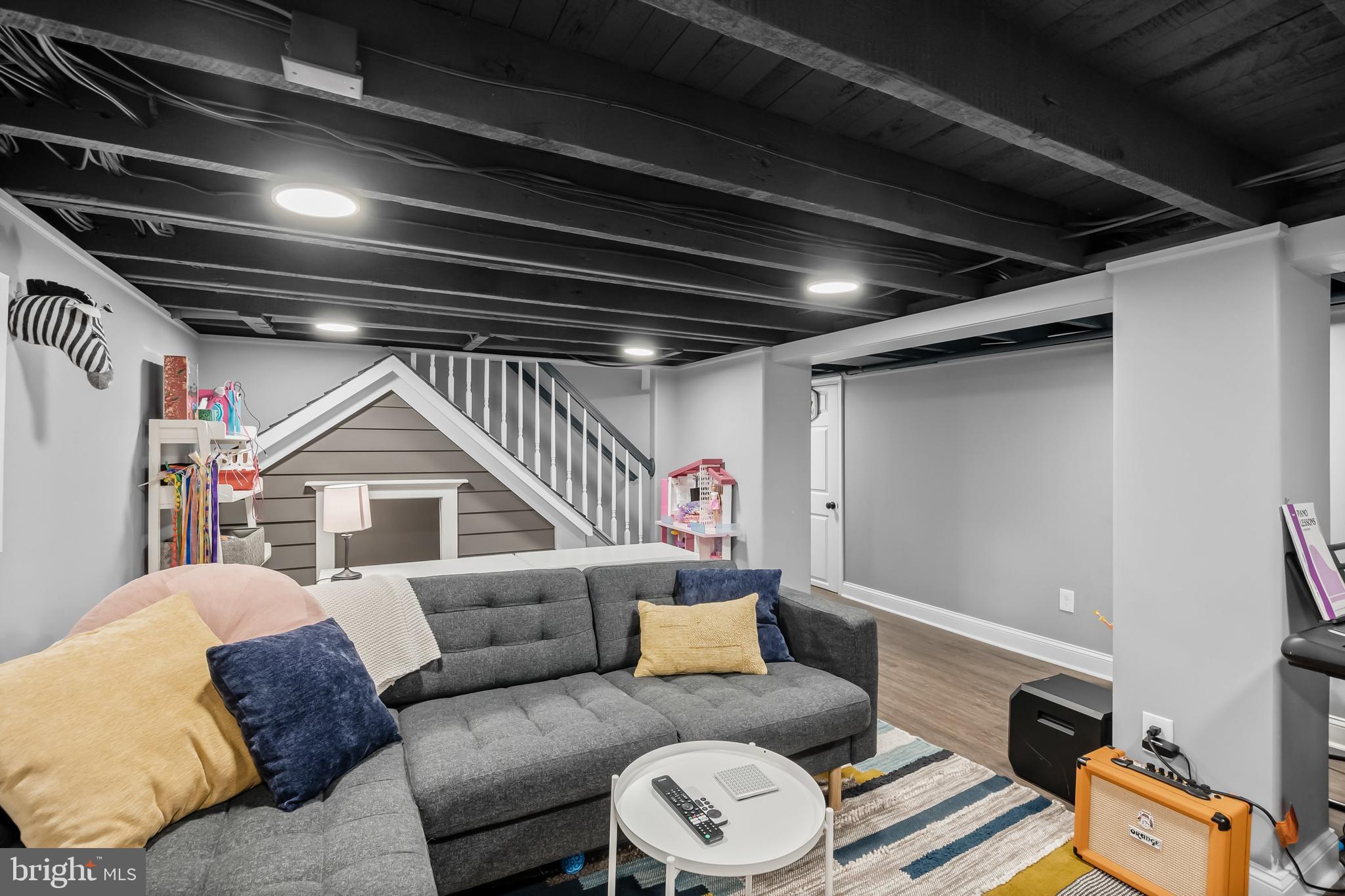 43 Estaugh Avenue Haddonfield, NJ 08033 - Photo 32 of 38 a living room with furniture and a chandelier