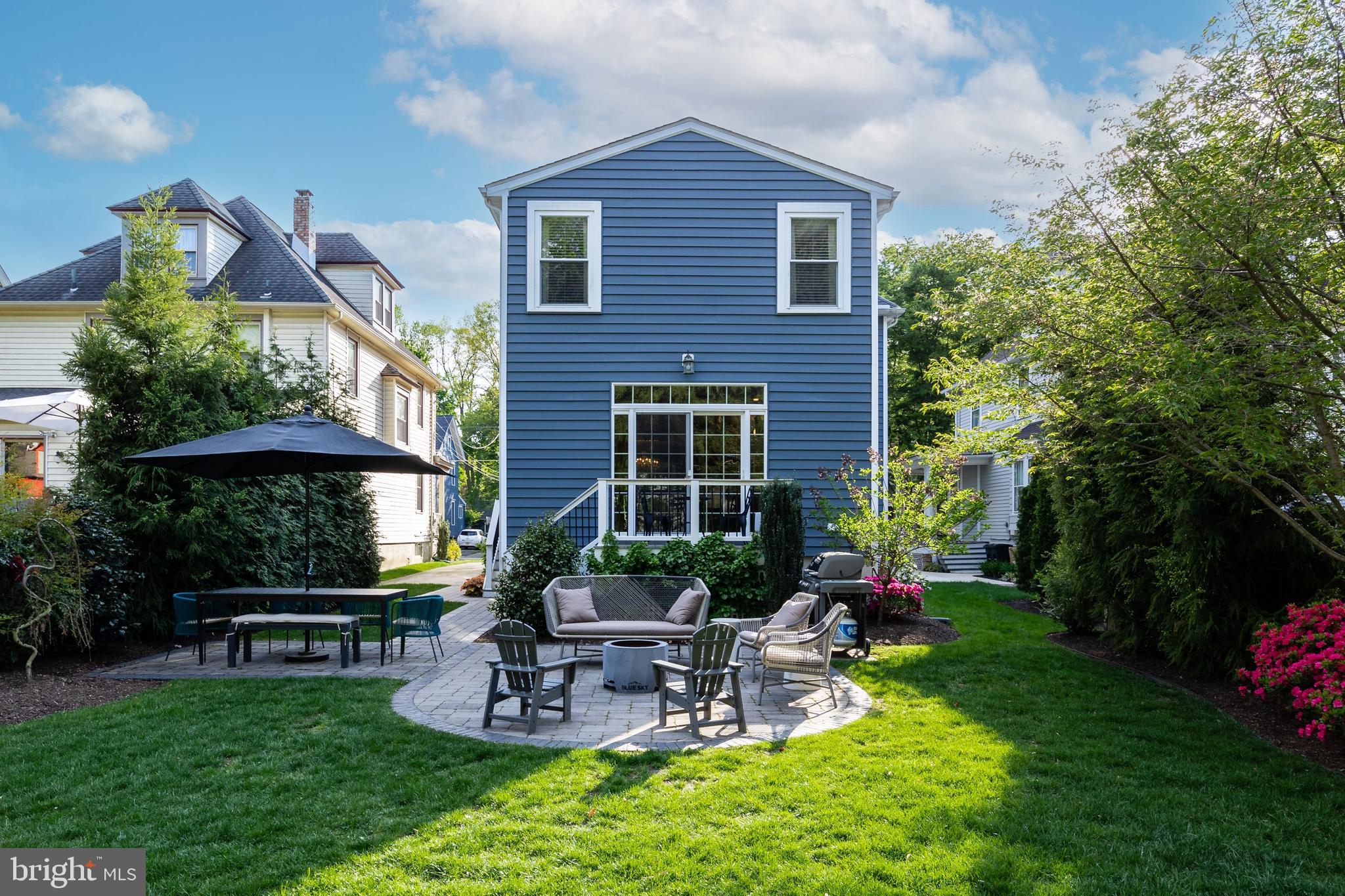 43 Estaugh Avenue Haddonfield, NJ 08033 - Photo 34 of 38 a view of a chair and table in backyard of the house