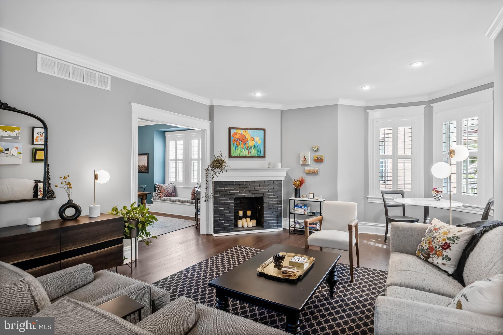 43 Estaugh Avenue Haddonfield, NJ 08033 - Photo 7 of 38 a living room with furniture and a fireplace
