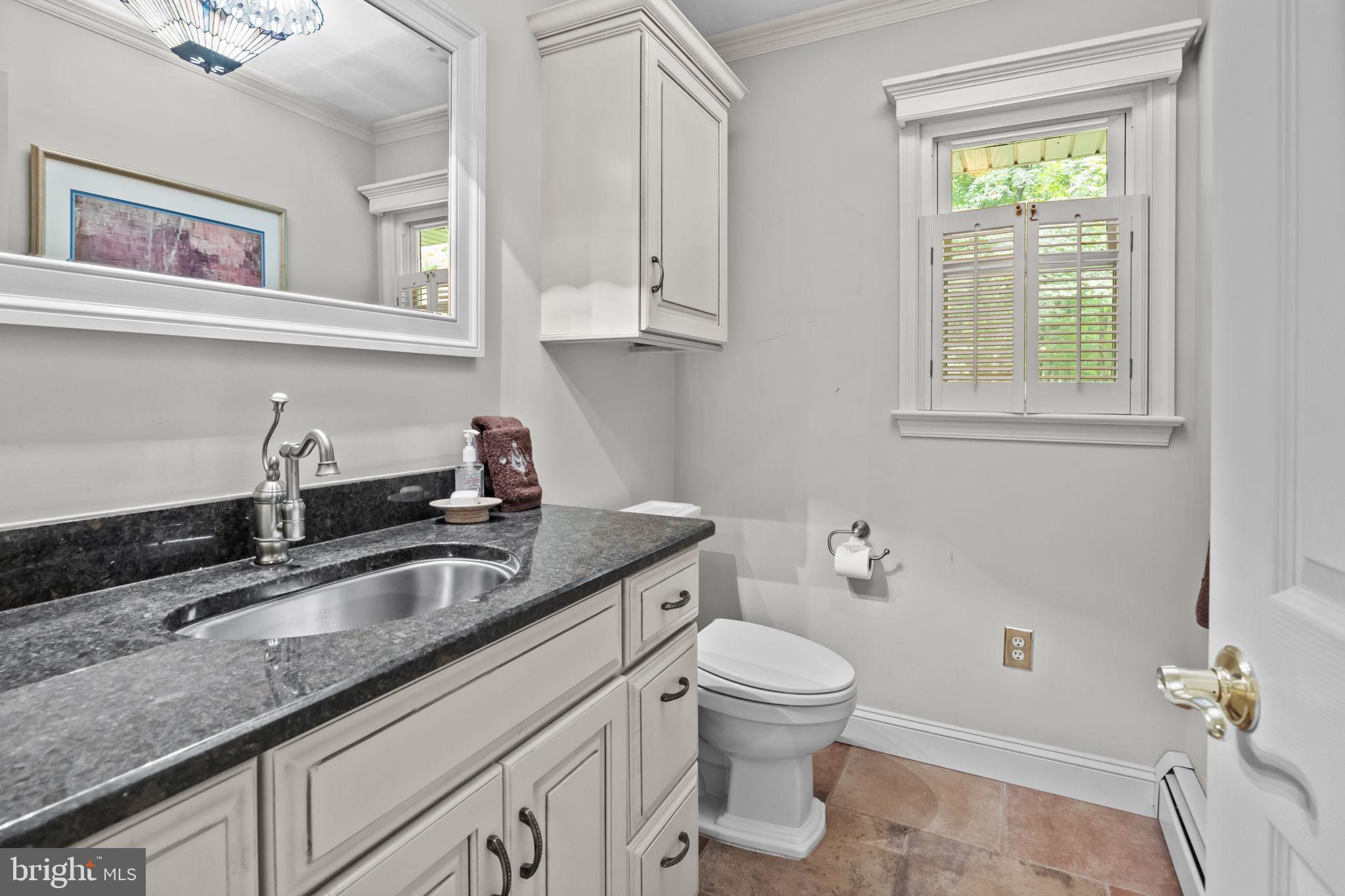 405 Skunk Hollow Road Chalfont, PA 18914 - Photo 16 of 46 Powder Room off of the Kitchen Area